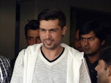 Banned Pakistani paceman Mohammad Aamer arrives for a press conference in Lahore on January 29, 2015