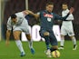 Nicolas Burdisso of Genoa and Gonzalo Higuain of Napoli in action during the Serie A match between SSC Napoli and Genoa CFC at Stadio San Paolo on January 26, 2015