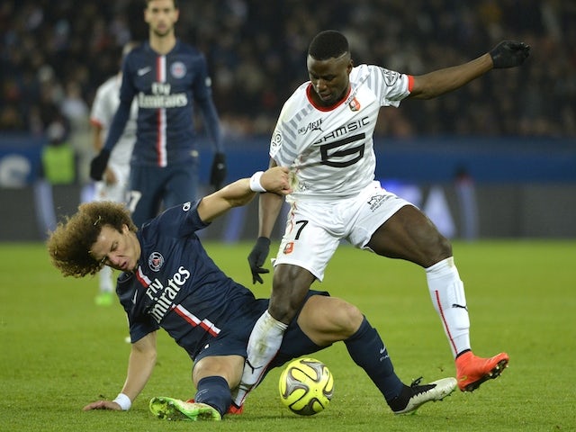 Rennes' French forward player Paul-Georges Ntep (R) vies with Paris Saint-Germain's Brazilian defender David Luiz during the French L1 football match on January 30, 2015