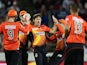 Brad Hogg of the Scorchers celebrates with team mates after taking the wicket of Jordan Silk of the Sixers during the Big Bash League final match between the Sydney Sixers and the Perth Scorchers at Manuka Oval on January 28, 2015