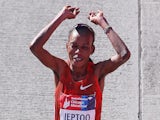 Rita Jeptoo of Kenya celebrates after winning of the 2014 Bank of America Chicago Marathon on October 12, 2014 