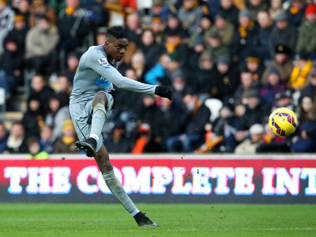 Sammy Ameobi of Newcastle United scores his team's second goal during the Barclays Premier League match between Hull City and Newcastle United at KC Stadium on January 31, 2015