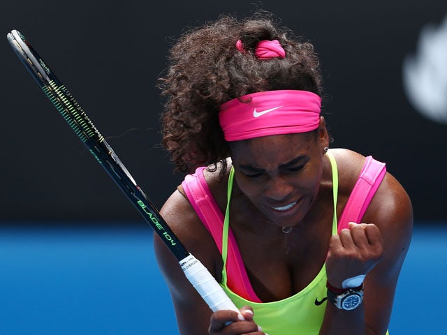 Serena Williams of the United States celebrates winning her fourth round match against Garbine Muguruza of Spain during day eight of the 2015 Australian Open at Melbourne Park on January 26, 2015