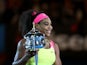 Serena Williams of the United States holds the Daphne Akhurst Memorial Cup after winning the women's final match against Maria Sharapova of Russia during day 13 of the 2015 Australian Open at Melbourne Park on January 31, 2015