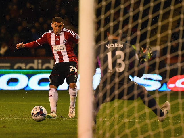 Che Adams of Sheffield United scores his first goal during the Capital One Cup Semi-Final Second Leg match between Sheffield United and Tottenham Hotspur at Bramall Lane on January 28, 2015