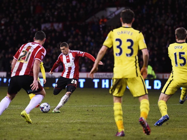 Che Adams of Sheffield United scores his second goal during the Capital One Cup Semi-Final Second Leg match between Sheffield United and Tottenham Hotspur at Bramall Lane on January 28, 2015