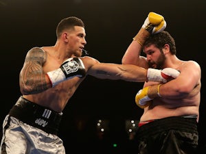 Sonny Bill Williams throws a right at Chauncy Welliver during their heavyweight bout during the Footy Show Fight Night at Allphones Arena on January 31, 2015