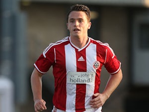 McGinn joins Dundee on loan