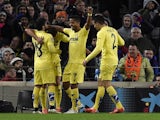 Villarreal's players celebrates after scoring a goal during the Spanish league football match FC Barcelona vs Villarreal CF at the Camp Nou stadium in Barcelona on February 1, 2015