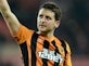 Alex Bruce rejoins Wigan Athletic