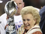 Ann Mara, mother of John Mara, co-owner of the New York Giants celebrates with the Vince Lombardi trophy after the won 17-14 against the New England Patriots during Super Bowl XLII on February 3, 2008
