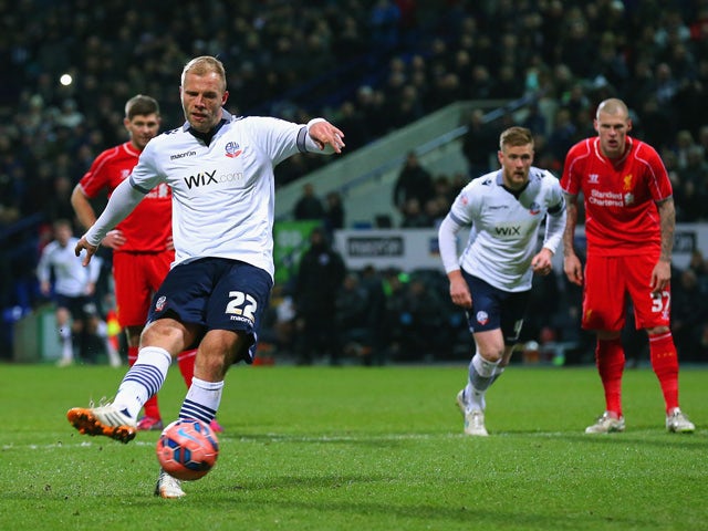 Eidur Gudjohnsen of Bolton Wanderers scores the opening goal from the penalty spot during the FA Cup Fourth round replay between Bolton Wanderers and Liverpool at Macron Stadium on February 4, 2015