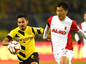 Half-Time Report: Dortmund on level terms with Augsburg
