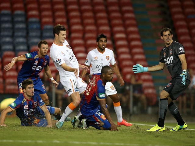 Jets players watch the ball go into the net near the end of the game during the round 16 A-League match between the Newcastle Jets and Brisbane Roar at Hunter Stadium on February 6, 2015 