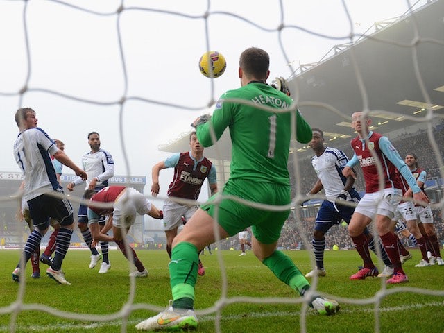 Chris Brunt heads home West Bromwich Albion's first goal during the Premier League match against Burnley at Turf Moor on February 8, 2015