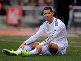 Cristiano Ronaldo of Real Madrid looks on after taking a fall during the La Liga match between Club Atletico de Madrid and Real Madrid on February 7, 2015