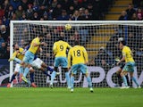 Joe Ledley of Crystal Palace scores from a header during the Barclays Premier League match between Leicester City and Crystal Palace at the King Power Stadium on February 7, 2015