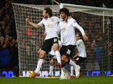 Daley Blind of Manchester United celebrates scoring their first goal with Marouane Fellaini during the Barclays Premier League match against West Ham on February 8, 2015