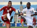 Equatorial Guinea's midfielder Emilio Nsue (L) challenges Democratic Republic of the Congo's defender Cedric Mongongu during the 2015 African Cup of Nations third place play-off match on February 7, 2015