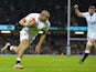 England's centre Jonathan Joseph scores a try during the Six Nations international rugby union match between Wales and England at the Millennium Stadium in Cardiff, south Wales, on February 6, 2015
