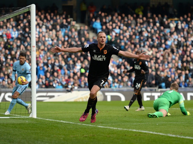 Hull City's Irish midfielder David Meyler celebrates scoring his team's first goal during the English Premier League football match between Manchester City and Hull City at the The Etihad Stadium in Manchester, north west England, on February 7, 2015