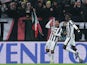 Juventus' Argentinian forward Alberto Carlos Tevez celebrates after scoring on February 7, 2015