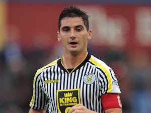 Kenny McLean of St Mirren in action during the pre season friendly match between Carlisle United and St Mirren at Brunton Park on August 01, 2014