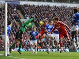 Dirk Kuyt of Liverpool scores the opening goal during the Barclays Premier League match between Liverpool and Everton at Anfield on February 6, 2010