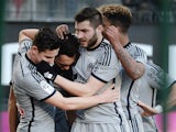 Marseille's Argentinian forward Lucas Ocampos (2nd L) celebrates scoring a goal with teammates in the game against Rennes on February 7, 2015