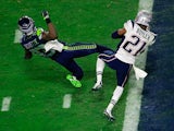 Malcolm Butler #21 of the New England Patriots intercepts a pass by Russell Wilson #3 of the Seattle Seahawks intended for Ricardo Lockette #83 late in the fourth quarter during Super Bowl XLIX at University of Phoenix Stadium on February 1, 2015