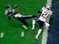 Malcolm Butler #21 of the New England Patriots intercepts a pass by Russell Wilson #3 of the Seattle Seahawks intended for Ricardo Lockette #83 late in the fourth quarter during Super Bowl XLIX at University of Phoenix Stadium on February 1, 2015
