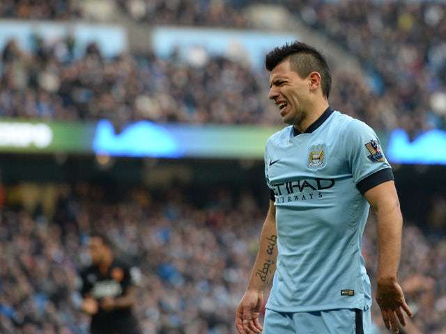 Manchester City's Argentinian striker Sergio Aguero reacts during the English Premier League football match between Manchester City and Hull City at the The Etihad Stadium in Manchester, north west England, on February 7, 2015