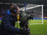 A TV cameraman films the action during the Barclays Premier League match between Leicester City and Crystal Palace at the King Power Stadium on February 7, 2015