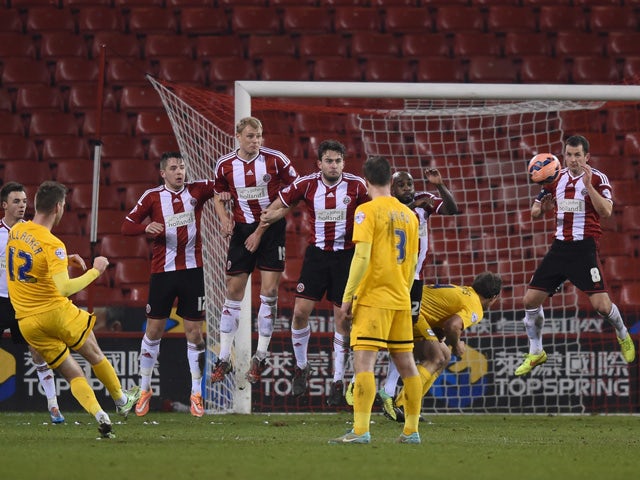 Paul Gallagher of Preston scores a free kick to make it 1-1 during the FA Cup Fourth Round match between Sheffield United and Preston North End at Bramall Lane on February 3, 2015
