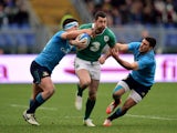 Rob Kearney of Ireland is tackled by Luca Morisi of Italy and Edoardo Gori of Italy during the RBS Six Nations match between Italy and Ireland at the Stadio Olimpico on February 7, 2015