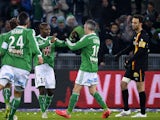 Saint-Etienne's Cameroonian forward Landry N'Guemo celebrates with St Etienne's French midfielder Fabien Lemoine after scoring a goal during the French L1 football match AS Saint-Etienne (ASSE) vs Racing Club Lens (RCL) on February 6, 2015