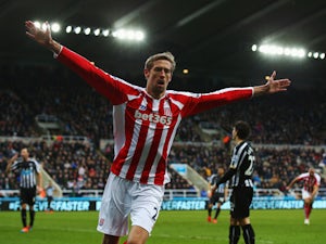 Crouch rescues late point for Stoke