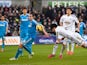  Swansea City player Ki Sung-Yueng dives to head the first Swansea goal during the Barclays Premier League match between Swansea City and Sunderland at Liberty Stadium on February 7, 2015