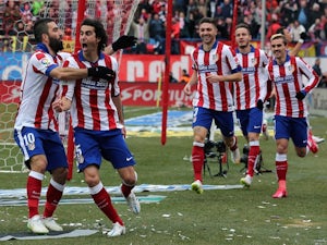 Atletico cruise past Real in derby