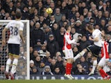 Tottenham Hotspur's English striker Harry Kane heads the ball to score their second goal during the English Premier League football match between Tottenham Hotspur and Arsenal at White Hart Lane in London, on February 7, 2015
