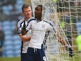 Brown Ideye of West Brom celebrates scoring their second goal with Chris Brunt of West Brom during the Barclays Premier League match between Burnley and West Bromwich Albion at Turf Moor on February 8, 2015