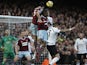 West Ham United's English defender James Tomkins (up L) wins a header at a corner during the English Premier League football match between West Ham United and Manchester United at the Boleyn Ground, Upton Park, in east London, on February 8, 2015