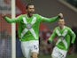 Wolfsburg's forward Bas Dost of the Netherlands celebrates scoring the opening goal during the German first division Bundesliga football match VfL Wolfsburg vs 1899 Hoffenheim in Wolfsburg, central Germany, on February 7, 2015
