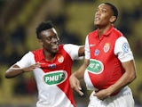 Monaco's French forward Anthony Martial (R) celebrates after scoring a goal with teammate midfielder Alain Traore of Burkina Faso during the French Cup football match on February 11, 2015