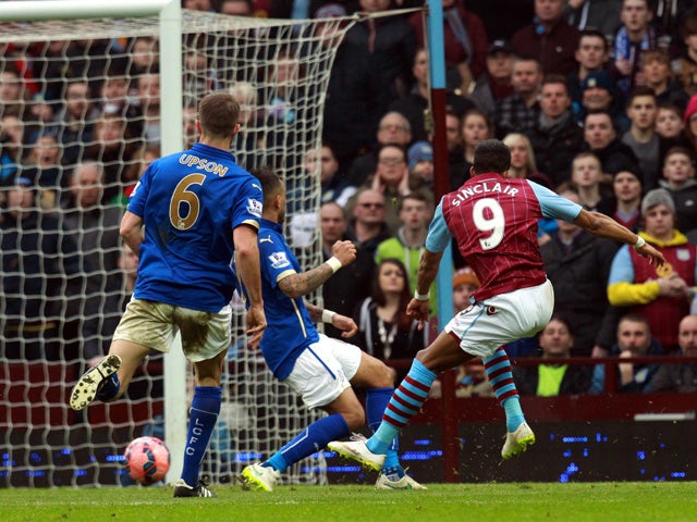 Aston Villa's English midfielder Scott Sinclair shoots to scores their second goal during the FA Cup fifth round football match between Aston Villa and Leicester City at Villa Park in Birmingham, central England on February 15, 2015