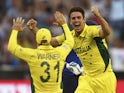 Mitch Marsh of Australia celebrates after taking the wicket of Joe Root of England during the 2015 ICC Cricket World Cup match between England and Australia at Melbourne Cricket Ground on February 14, 2015