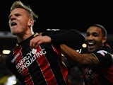 Matt Ritchie of Bournemouth celebrates with Callum Wilson as he scores their first goal during the Sky Bet Championship match between AFC Bournemouth and Derby County at Goldsands Stadium on February 10, 2015