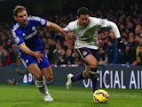 Branislav Ivanovic of Chelsea and Bryan Oviedo of Everton battle for the ball during the Barclays Premier League match on February 11, 2015