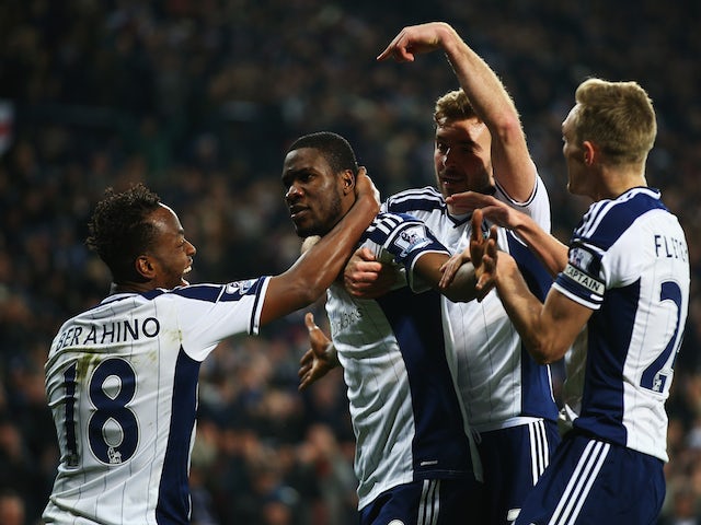 Brown Ideye of West Brom celebrates scoring the opening goal with team mates during the Barclays Premier League match against Swansea City on February 11, 2015