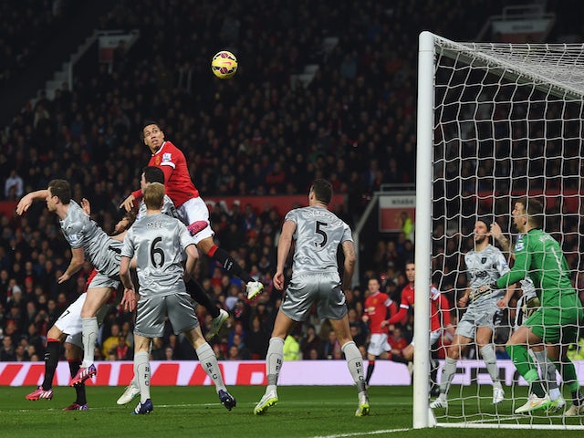 Chris Smalling of Manchester United scores the opening goal during the Barclays Premier League match against Burnley on February 11, 2015